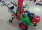 赤+白い水田の収穫者機械、トラクターが付いている小さいムギの打抜き機 サプライヤー